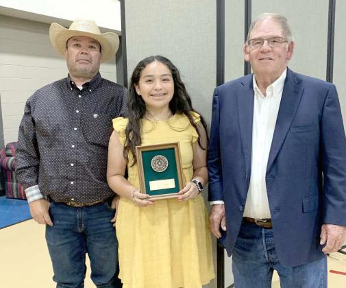 SUDAN STUDENT – Dianely Delgado of Sudan I.S.D. placed 3rd in the Area I Division of the Jr. Division Essay Contest in the Texas Conservation Awards Program. Shown from left to right: Mario Rodriguez, father, Dianely Delgado, and Roy Thompson, Lamb Co. SWCD Board Vice-Chairman. (Submitted Photo)