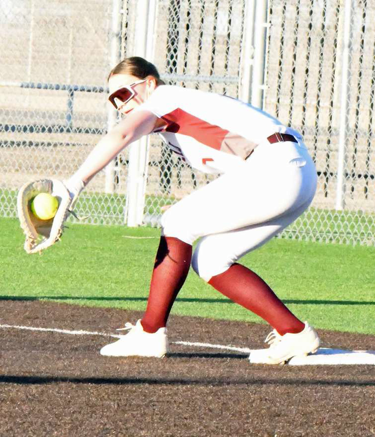 Littlefield first baseman, Lyric Rios, catches a throw from Natalia Sanchez for out number two in the top of the sixth inning, of the Lady Cats’, 5-0, loss to Levelland on Monday at Lady Cat field. (Staff Photo by Derek Lopez)