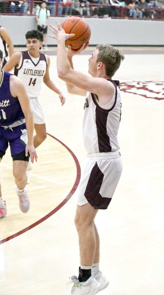 FIRING THE THREE BALL - Littlefield sophomore guard, Chip Green, fires up a three from the left elbow, during the frist half of the Wildcats’, 60-54, victory over the Dimmitt Bobcats on senior night on Tuesday, keeping them in the hunt for a district title. (Staff Photo by Derek Lopez)