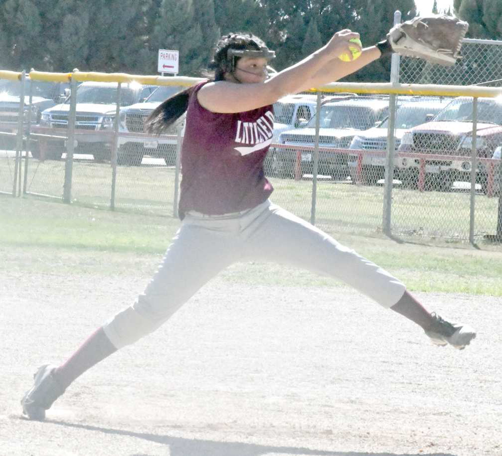 COMPLETE GAME - Littlefield senior pitcher, Cadence Sanchez, winds up to send a pitch towards home plate, during the Lady Cats’ eight-inning bout with Muleshoe on the road on Tuesday afternoon. The Lady Cats won the extra-inning affair, 3-2. (Staff Photo by Derek Lopez)