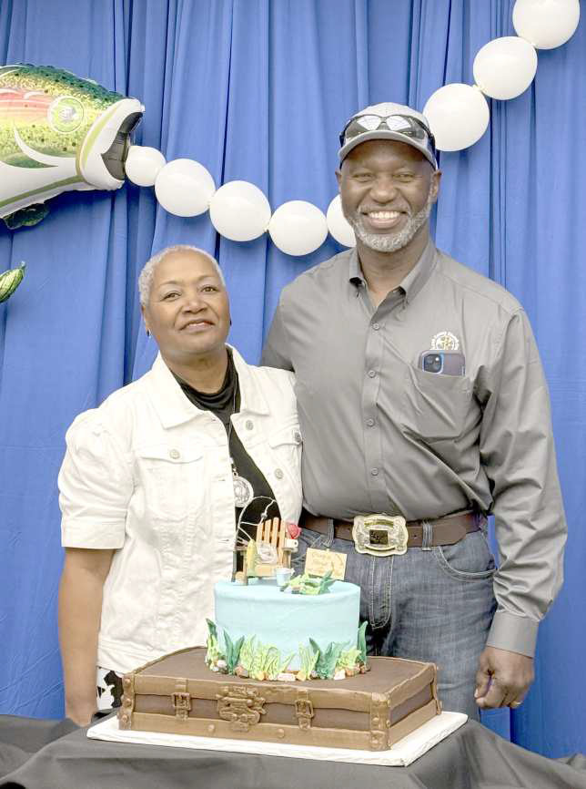 Craig Johnson, right, with his wife, Darlene, at his retirement party from Lamb County Electric Cooperative that was held on Friday, March 7, 2025 at the Coop. (Submitted Photo)
