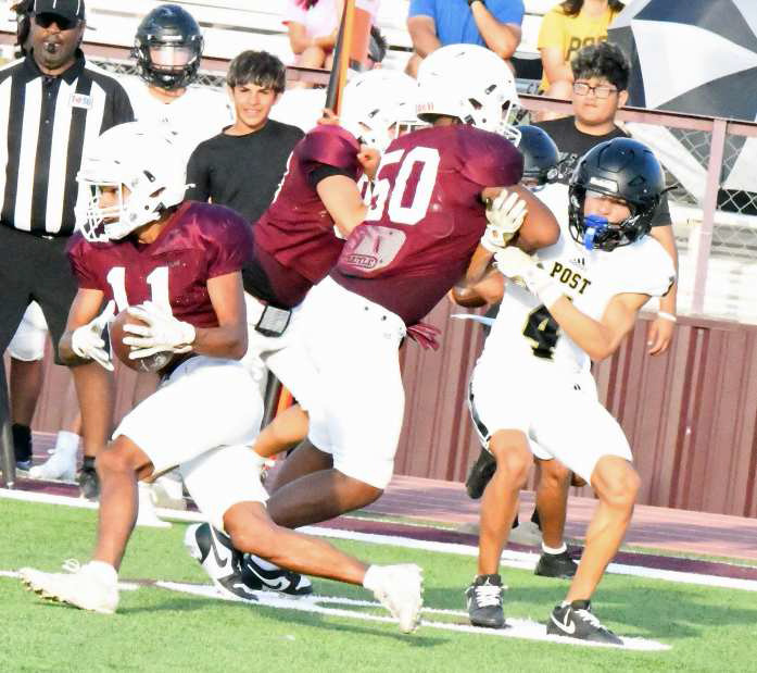 Littlefield’s Zane Champion catches a screen pass and gets around a block on the outside from CJ Weaver for a nice gain during the Wildcat’s first scrimmage last Friday against Post. (Staff Photo by Derek Lopez)
