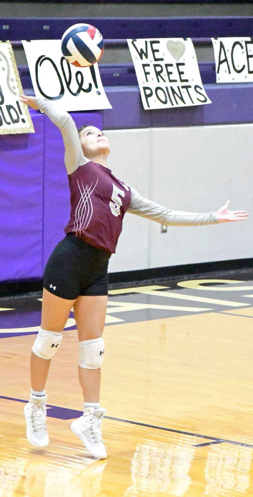Littlefield junior, Cali Saldana, leaps up to deliver a serve, during the first set of the Lady Cat’s Bi-district loss to the Bushland Lady Falcons on Monday in the first round of the volleyball play-offs at Dimmitt High School. (Staff Photo by Derek Lopez)