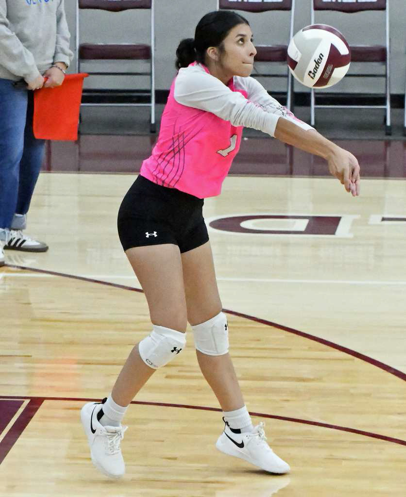 Olton’s Kaitlyn Avalos, breaks a serve, during the first set of the Fillies’ Littlefield Tournament-opener on Thursday against Klondike at Wildcat Gym. (Staff Photo by Derek Lopez)