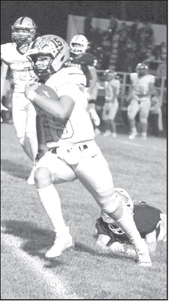 Sudan’s Caleb Groetken cuts it back across the field beating a defender for a 40-yard touchdown run, capping off the Hornets, 35-6, victory over Vega on the road Friday night. (Staff Photo by Derek Lopez)