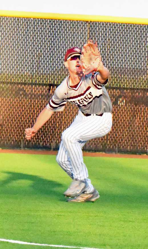 Littlefield’sBradyn Redman catches a fly ball in left field, during the bottom of the third inning to retire the side, as the Wildcats fell to Lamesa on Tuesday, 5-4. (Staff Photo by Derek Lopez)