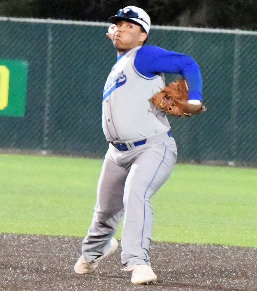 Olton shortstop, Fabian Gutierrez, fields a ground ball and throws it to first for an out, during the top of the first inning of the Mustangs’ loss to Nazareth in Littlefield on Tuesday. (Staff Photo by Derek Lopez)