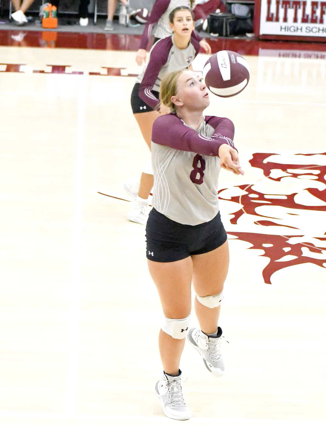 KEEPING THE BALL IN PLAY - Littlefield’s Taryn Golden bumps the ball back into the court to give the Lady Cats a chance at an attack, during the first set of their match against Lamesa last Thursday at the Littlefield Tournament. (Staff Photo by Derek Lopez)