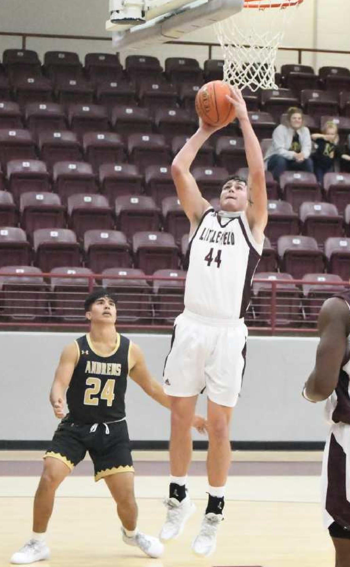 UP FOR TWO - Littlefield senior forward, Chris Brown (44), goes up and drops in a lay-up for the Wildcats, during the first half of their home game against the Andrews Mustangs on Monday. The Wildcats won the contest, 61-35, at Wildcat Gym. (Staff Photo by Derek Lopez)