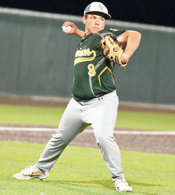 Springlake-Earth’s Braden Bradley comes off of the mound and fields a ball on the left side, throwing it to first for an out, during their, 144, loss to Crosbyton on Thursday in Littlefield. (Staff Photo by Derek Lopez)