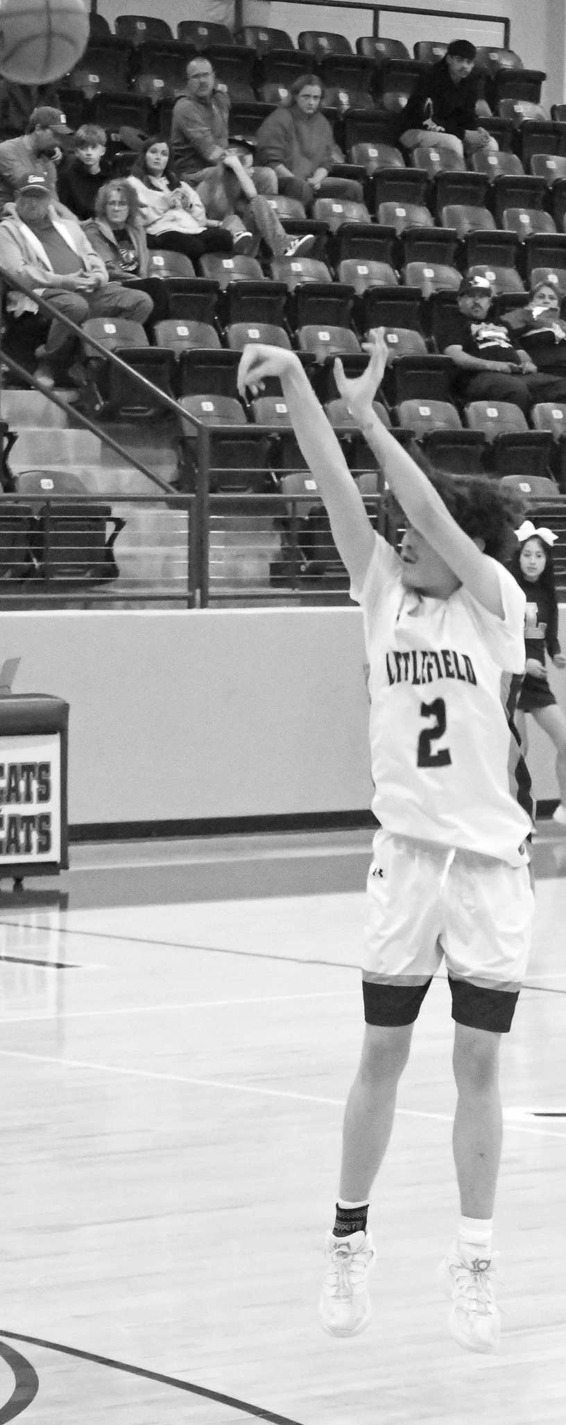 Littlefield’s Andrew Davis (2), buries a three from the top of the key, during the first half of the Wildcats’ win Tuesday night. (Staff Photo by Derek Lopez)