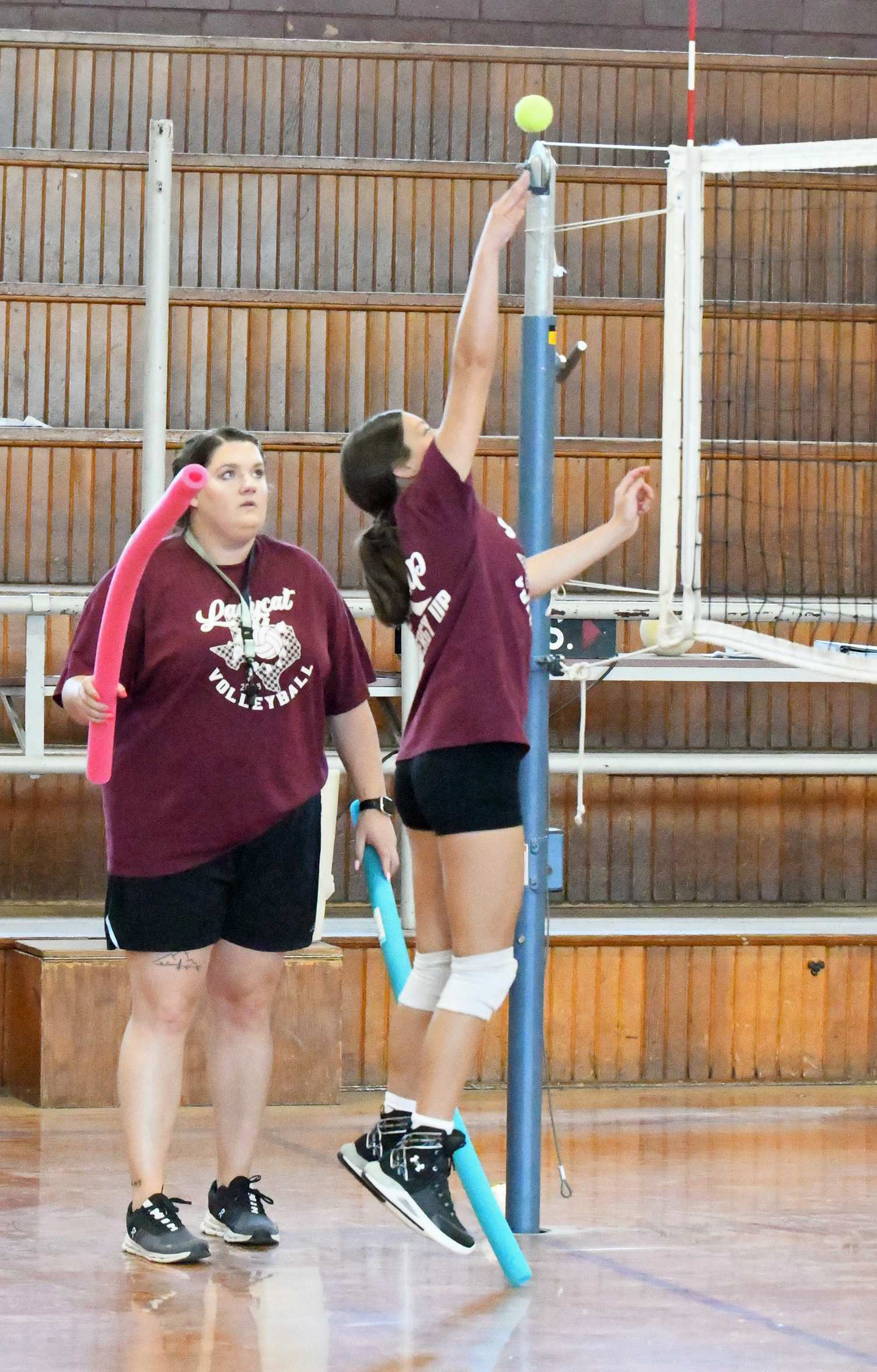 Littlefield Head Volleyball Coach Kaylee Longoria coaches her afternoon camp through drills, during the second day of camp on July 16th at the Junior High Gymnasium. (Staff Photo by Derek Lopez)