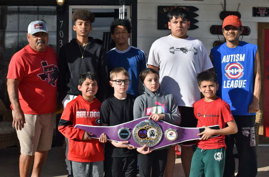 Littlefield Eagles boxing club competed in Garden City Kansas in the Rita Torres Invitational Boxing Tournament on February 24th. (Back L-R): Coach Rene Trevino, Ayden Arredondo, Jayden Duran, Keyshawn Aguilera and Coach Joe. (Front L-R): Kayden Rodrigez, Dallas Davis, Bella Jaramillo and Pablo Prieto. (Submitted Photo)