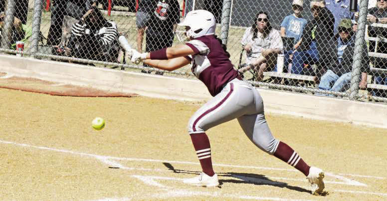 Littlefield senior, Tailyn Gomez, lays down a bunt to get on base in the top of the seventh inning on Saturday, during the Lady Cats, 19-18, victory over Muleshoe in their first meeting of district play. (Staff Photo by Derek Lopez)