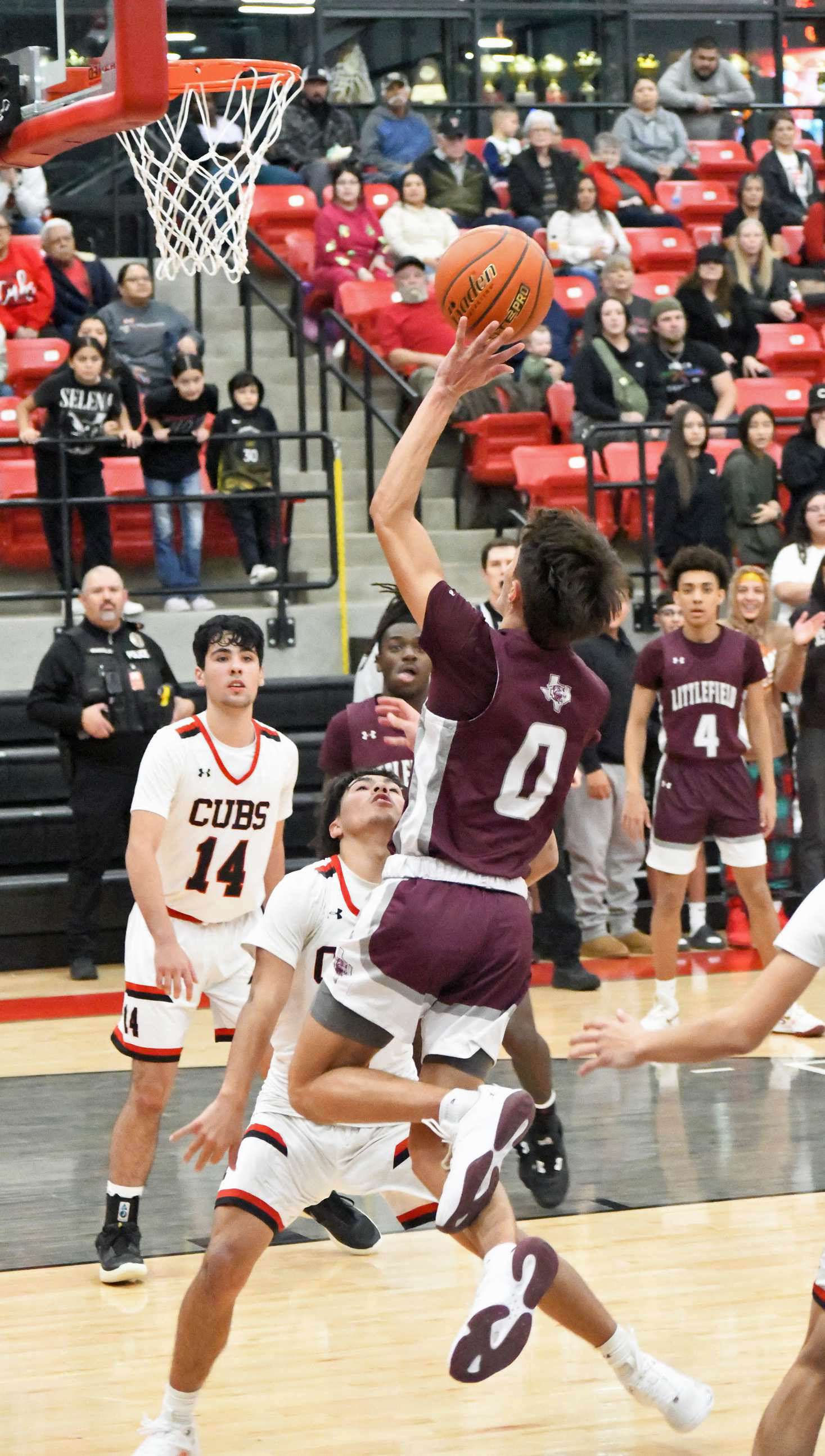Littlefield Wildcat’s senior, Omar Martinez (0), puts up a floater over the Cubs defense, during the fourth quarter of the Wildcats’, 58-52, loss in their district-opener last Tuesday in Brownfield. (Staff Photo by Derek Lopez)