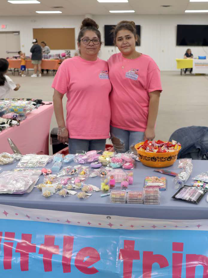 Erica Torres and Adalina Torres of Post, Texas at their delightful booth 12 Little Trinkets as well as the concession at Littlefield Trade Days. (Photo by Ann Reagan)