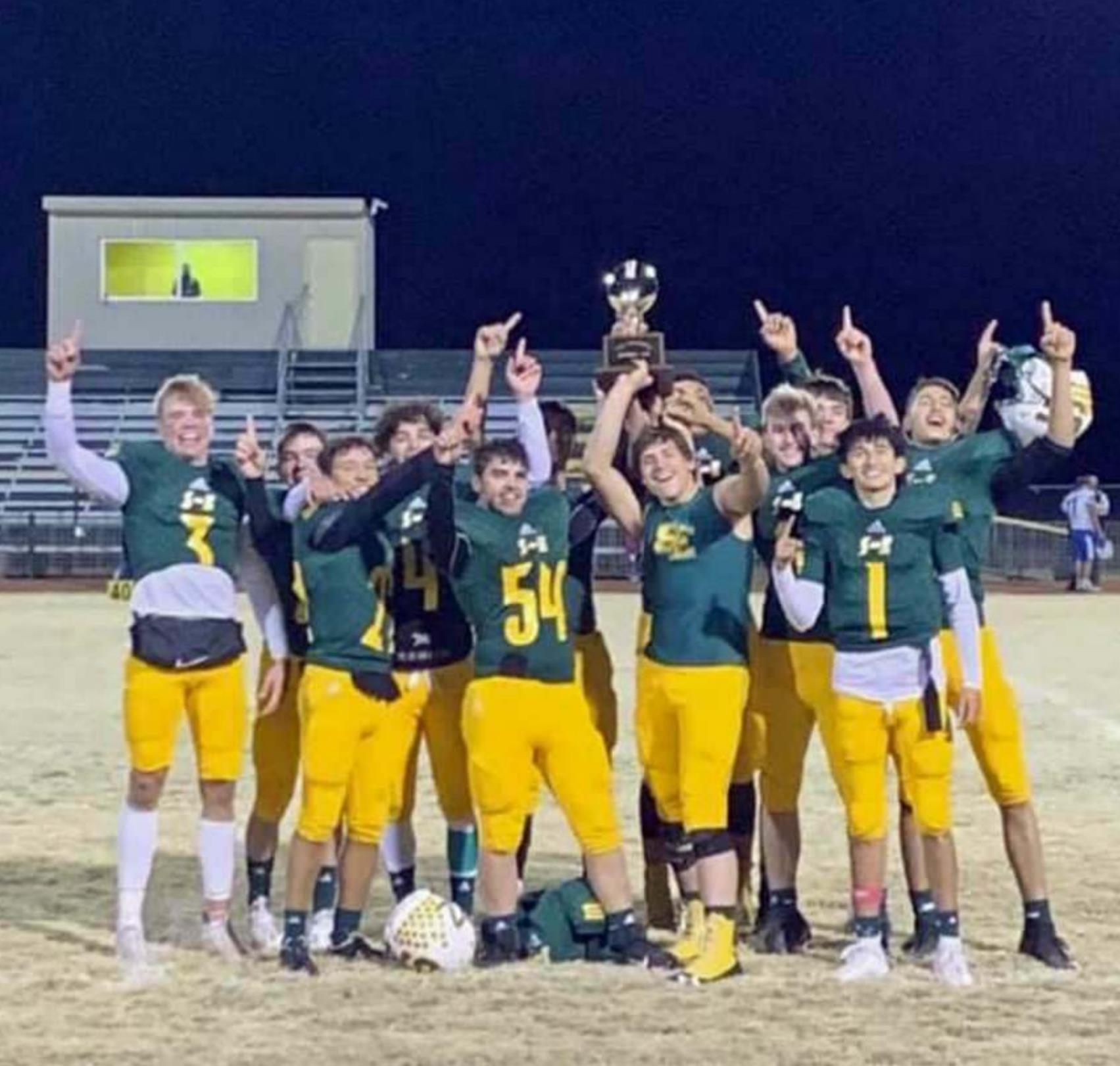 DISTRICT 2-A SIX-MAN DI CHAMPS -The Springlake-Earth Wolverines’ varsity football team rallied back from being down 24 points on Friday to take down Nazareth to claim the District 2-A Championship. The Wolverines will close out District play on Friday against Kress, as they look to make a run through the play-offs. (Submitted Photo)