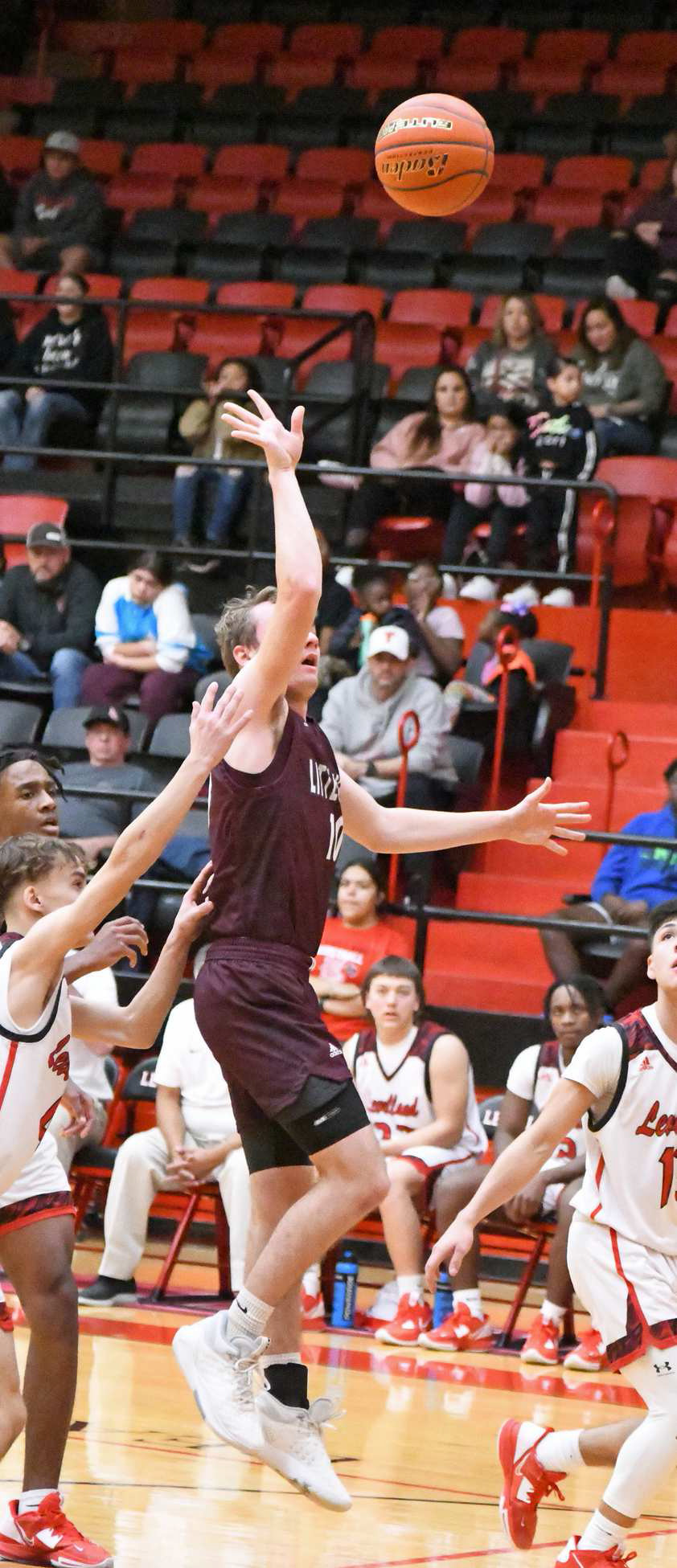 POINTS IN THE PAINT - Littlefield guard, Chip Green, puts up a floater in the lane, during the first half of the Wildcats’ double overtime loss on the road to the Lobos on Tuesday. (Staff Photo by Derek Lopez)