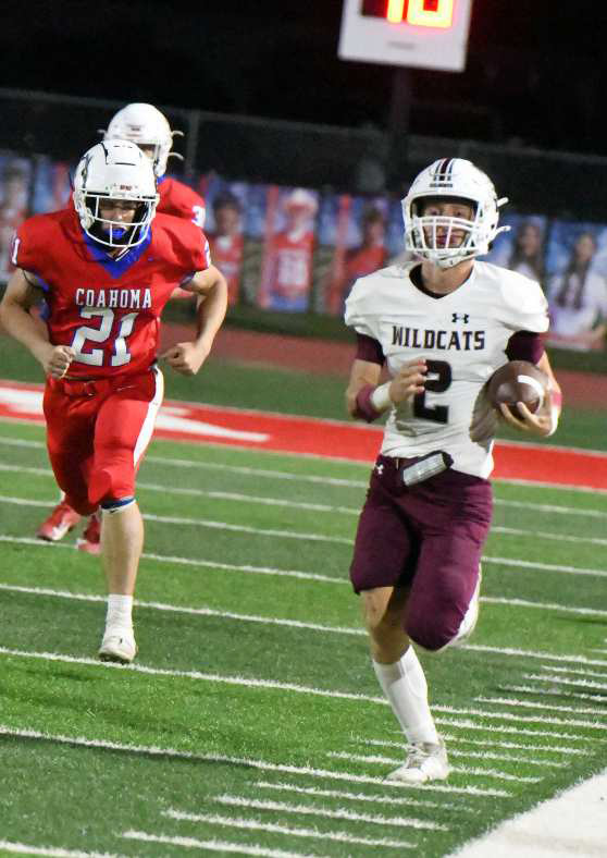 Littlefield’s, Major McNeese (2), catches a screen pass from Chip Green, and takes it 89 yards down the Littlefield sideline for a touchdown, during the fourth quarter of their, 71-70, loss to Coahoma on Friday on the road. (Staff Photo by Derek Lopez)