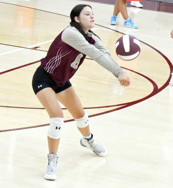 BREAKING THE SERVE - Littlefield libero, Maddie Brown, breaks the serve from LCHS, during the first set of their loss to the Lady Eagles on Tuesday at Wildcat Gymnasium. (Staff Photo by Derek Lopez)