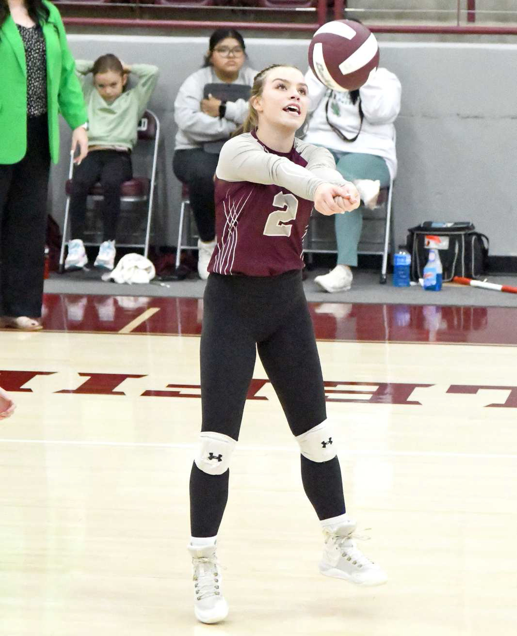 Littlefield senior, Kennadi Hanlin, bumps a ball up in the air, as the Lady Cats look to go on the attack, during the first set of their match with Childress on Saturday, at Wildcat Gym. (Staff Photo by Derek Lopez)