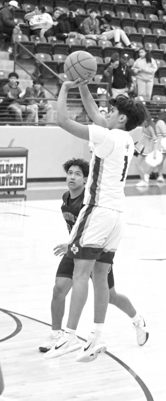 Littlefield’s Jayden Barrio (1) knocks down a jumper from the left elbow, during the first half of the Wildcats’ home vicotry over the Eagles on Wednesday at Wildcat Gym. (Staff Photo by Derek Lopez)