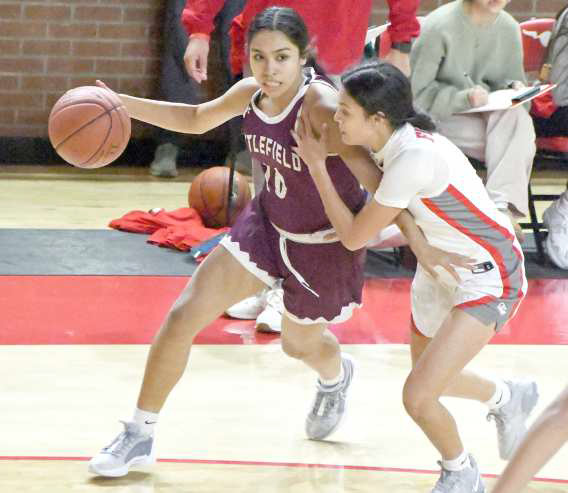 Littlefield’s Nevaeh Esquibel drive the right side, looking to make a play, during the first half of the Lady Cats’, 47-41, victory over the Denver City Fillies to open district play on Tuesday. (Staff Photo by Derek Lopez)