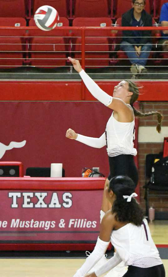 Littlefield’s Maggie McNeese goes up to deliver a hit, during the first set of the Lady Cats’ Denver City Tournament-opener against Snyder on Thursday. (Staff Photo by Derek Lopez)