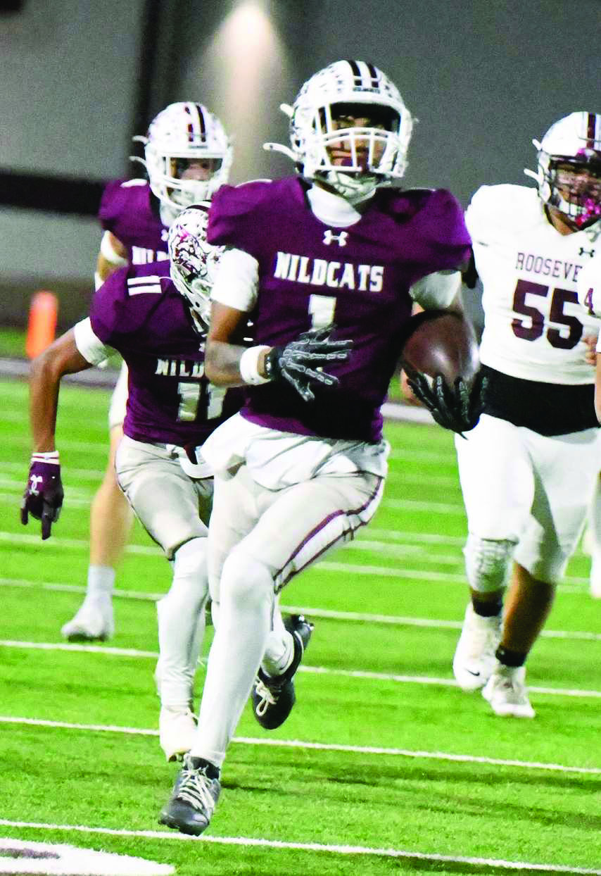 Littlefield junior receiver, Jayden Barrio, catches a screen pass from Sammy Saenz and takes it up field for a 62-yard touchdown, during the Wildcats victory over the Eagles on Friday. (Staff Photo by Derek Lopez)