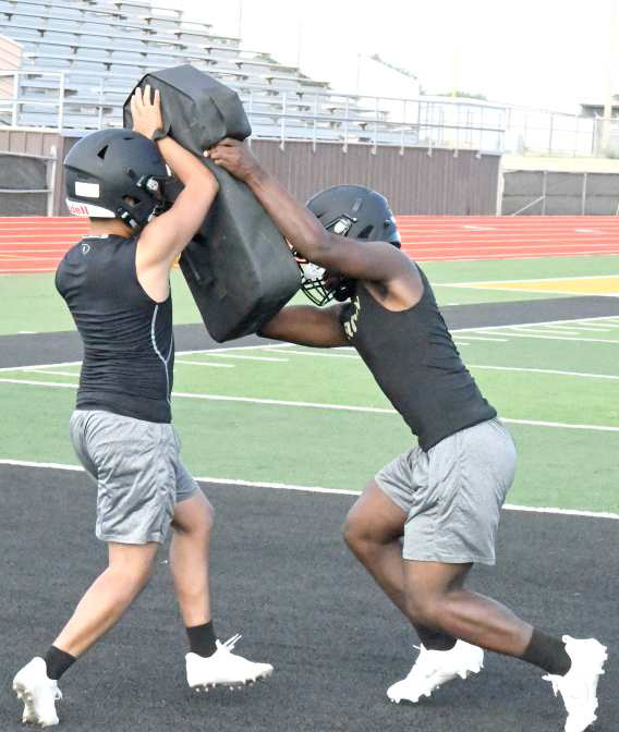 BLOCKING DRILLS - Sudan’s Marcello King carries out his block, during blocking drills on Tuesday, during day two of two-a-day practices. (Staff Photo by Derek Lopez)