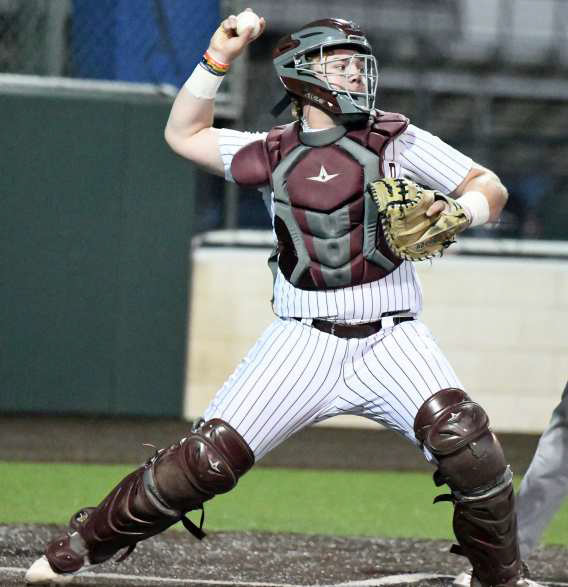 Littlefield senior catcher, Brenden Bowman, rifles a bullet down to second base to pick-off Trinity’s Colin McKinnon, to retire the side in the top of the third inning. Shortstop Gabe Mata was there for the tag. (Staff Photo by Derek Lopez)