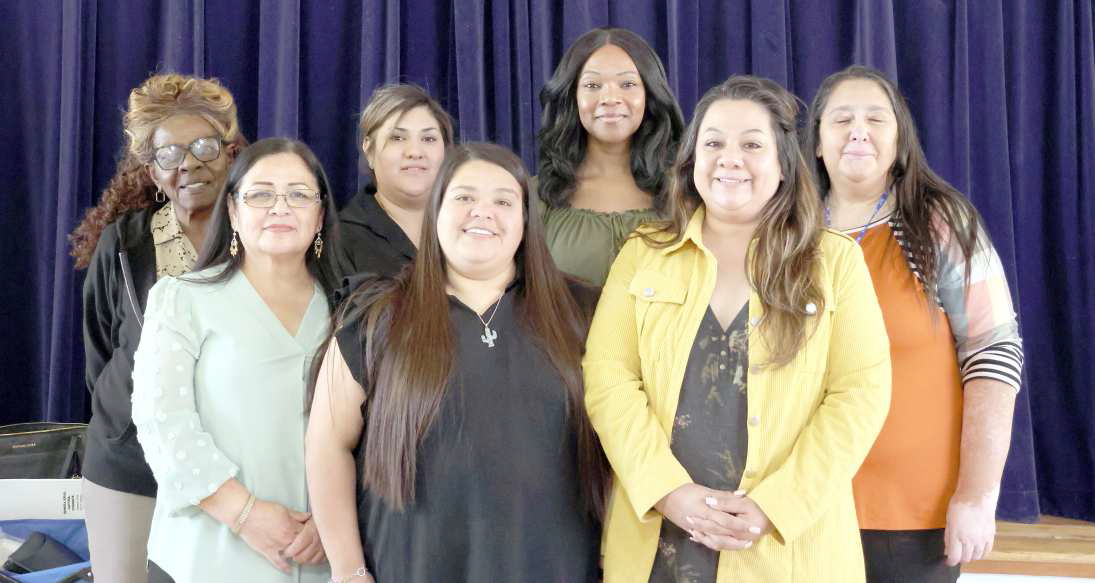 Volunteers of the Catholic Charities Diocese of Lubbock, Texas and SPCCA of Littlefield, Texas hosted a lunch and family education program at the Lamb County Community Action Center in Laguna Park on Tuesday February 25, 2025. Front row, left to right: Monica Elizondo, Madison Brown, and Jimmy Ramos. Back row, left to right: Jordan Randle, Kali Cornette, Sondra Okoruwa, and Anais Osmenaj. (Photo by Ann Reagan)