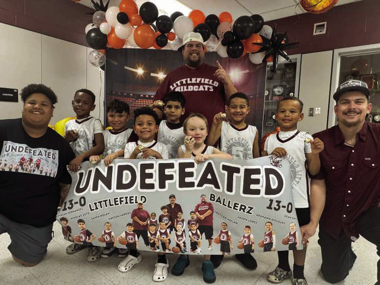 The Littlefield Wildcats 1st and 2nd Grade Boys team coached by Derek Lopez, Mariah Weaver and Austin Tyler won the Championship game on Sunday to cap off their season. (Shown L-R): Coach Mariah Weaver, Traycen Nolan, Kaeson Vargas, Jaden Lopez, Niko Soto, Coach Derek Lopez, Dean Davis, DeShawn Douglas, Jaxen Nolan, Azuriah Hernandez and Coach Austin Tyler. (Submitted Photo)