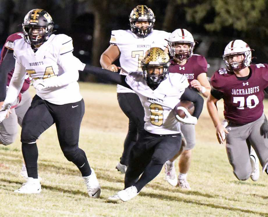 Sudan senior running back, Marcello King, breaks loose for a 48-yard touchdown run, during the first quarter of the Hornets, 36-14, victory on the road over the Ralls Jackrabbits to close out the regular season. (Staff Photo by Derek Lopez)
