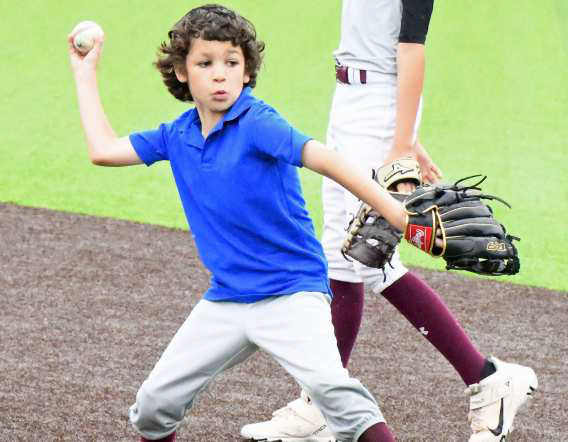 Campers at the Littlefield youth baseball camp are shown working on fielding and throwing, during the first day of camp on July 1st. (Staff Photo by Derek Lopez)