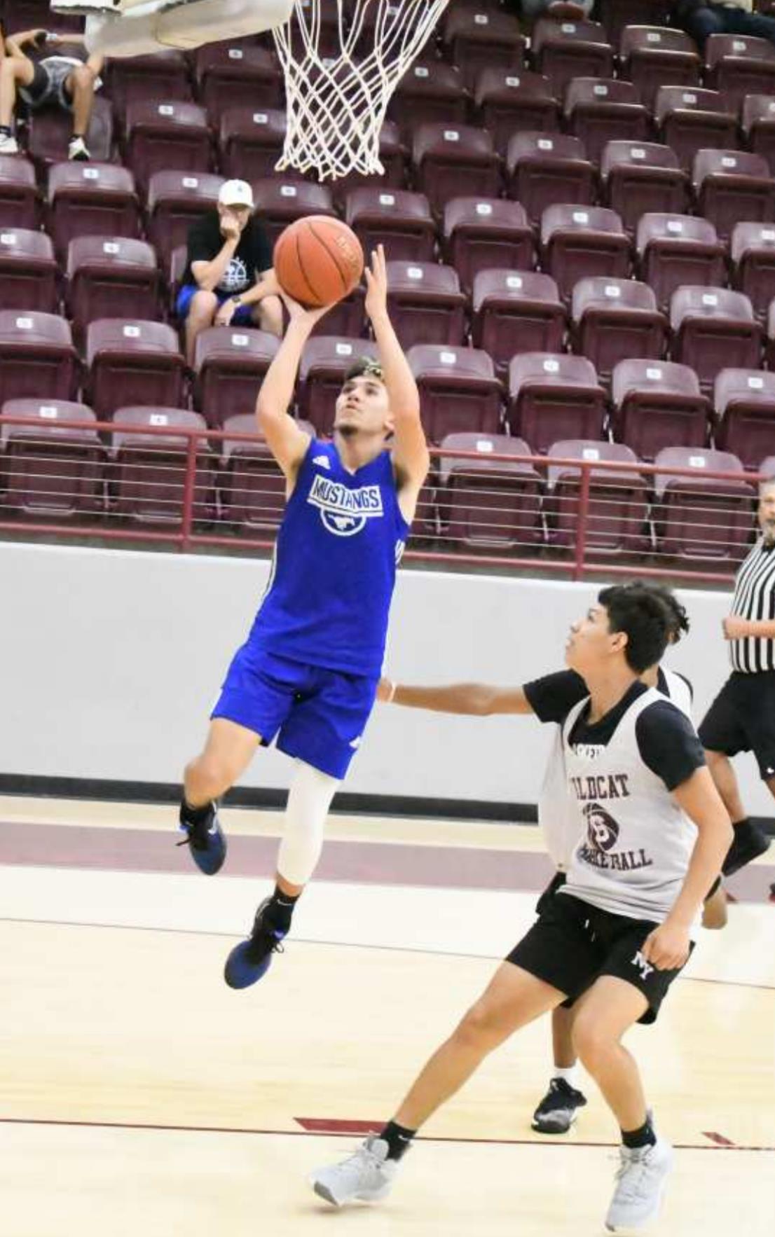 Wildcats hold off Mustangs, 46-36
