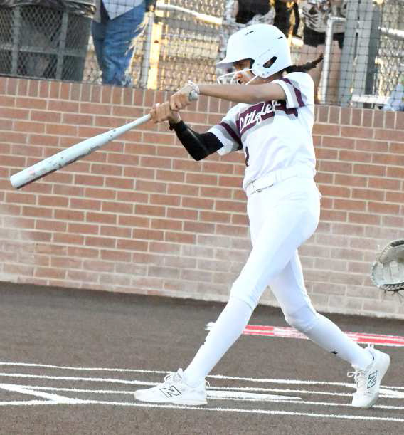 Littlefield freshman, Sophia Mata, rips a double into the left-center field gap to give the Lady Cats some offensive momentum in the bottom of the sixth inning of the Lady Cats’ 10-1, loss to the Bushland Lady Falcons in Plainview on Thursday in their Class 3A-DI Bi-district play-off game. (Staff Photo by Derek Lopez)
