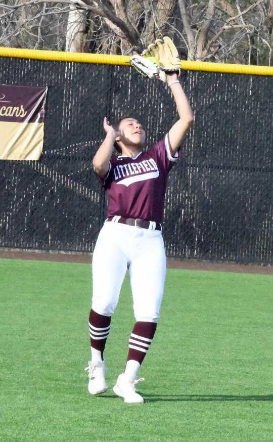 Littlefield junior, Alyssa Torres, catches a fly ball in left field for an out, during the Lady Cats’, 11-8, road loss to Lamesa on Tuesday. (Staff Photo by Derek Lopez)