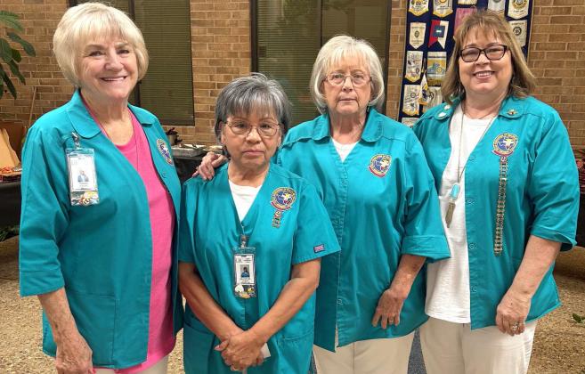 Auxillary members Diana Parker, Eva Reyes, Linda Williams and Lori Durham received their 200 hours bars at their pinning ceremony in May. (Submitted Photo)
