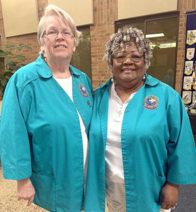 Auxillary members Doris Howell and Barbara Colbert receive their 300 hours bars at a pinning award ceremony in May. (Submitted Photo)