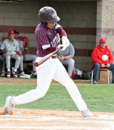 Littlefield senior, Isaiah Rodriguez, singles up the middle to lead off the top of the first inning for the WIldcats, during their extra inning loss to the Mustangs in Denver City on Tuesday. (Staff Photo by Derek Lopez)