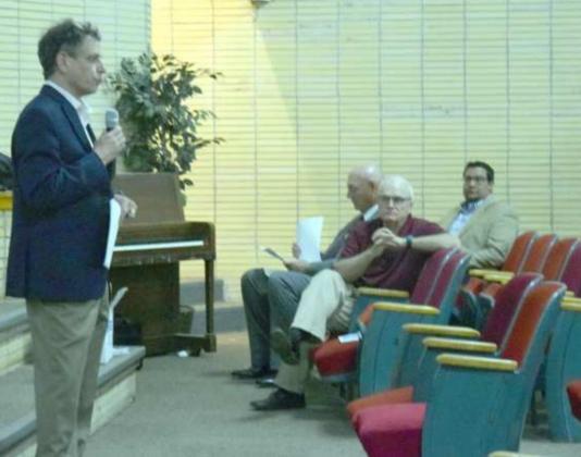A MEMBER of the planning team addresses the residents in attendance at the bond election meeting held April, 28, 2022. (Photo by Ann Reagan)