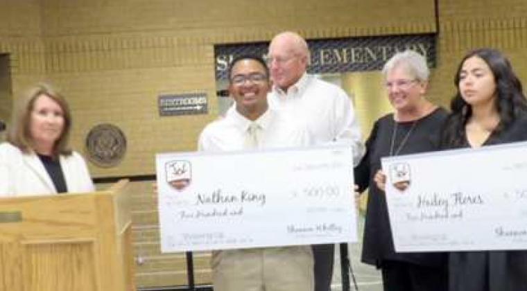 OUTSTANDING CHARACTER -- Two Sudan students received the Taylor Whitley Show-Up Awards at the Sudan Homecoming this fall. Shown left to right are Sudan School Board member Susan Baker, Sudan Senior Nathan King, Dennis Whitley, Lanette Whitley, and Sudan Senior Hailey Flores. Both students received $500 to be used as they see fit. (Submitted Photo)