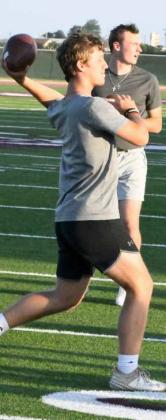 Quarterbacks and receivers worked on throwing/catching drills to open up the first day of Park Practice monday evening at Wildcat Stadium. (Staff Photo by Derek Lopez)