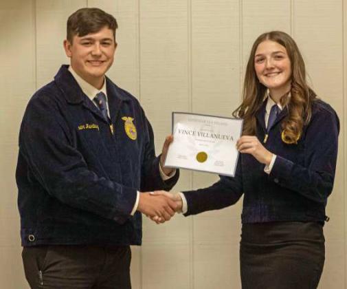 FFA Secretary Devyn Crouch presents Vince Villanueva with a Chapter FFA Degree at the annual FFA banquet on May 12, 2025. (Staff Photo by Madison Vidales)