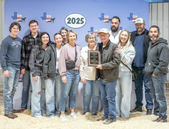 The Olton Livestock Show was dedicated to Jackie Burkhalter. He is a retired ag teacher that still helps some of the exhibitors with their show animals. (Submitted Photo)