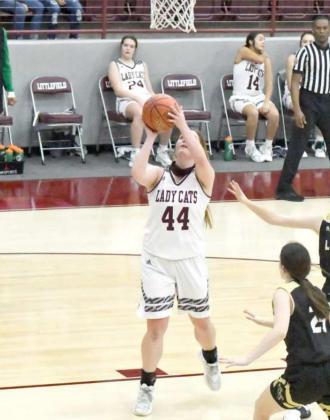POINTS IN THE PAINT—Littlefield junior forward,Ashtyn Parker, drops in a lay-up, during the second half of the Lady Cats’ district victory over Lamesa at Wildcat Gym on Friday. (Staff Photo by Derek Lopez)