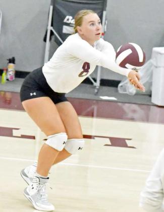 KEEPING THE BALLALIVE - Littlefield’s Taryn Golden bumps a ball up in the air as the Lady Cats look to set up an attack, during their victory over the Lubbock Titans on Tuesday at Wildcat Gymnasium. (Staff Photo by Derek Lopez)