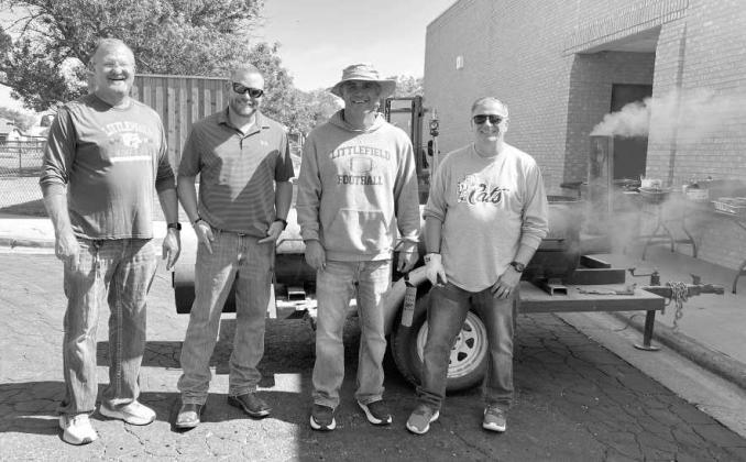 Littlefield ISD admin cooking a hamburger meal for district employees on their last regular work day of school Friday May 22nd. (L-R): Bryan Gregory, Bo Bryant, Mitch McNeese and Brette Southard. (Submitted Photo)