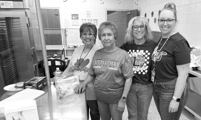 Littlefield ISD admin cooking a hamburger meal for district employees on their last regular work day of school Friday May 22nd. (L-R): Rhesa Merrifield, Josie Servantez, Jackie Milligan and Janet Muller. (Submitted Photo)